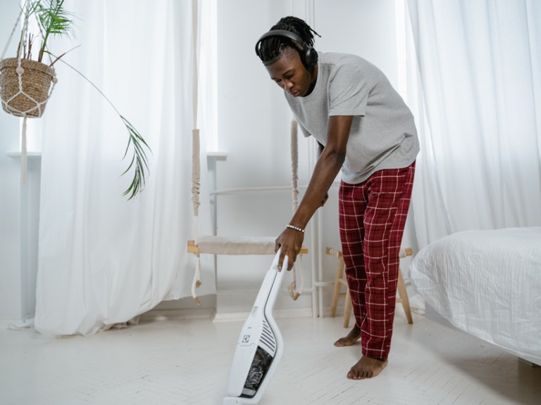 Uptown Person Vacuuming