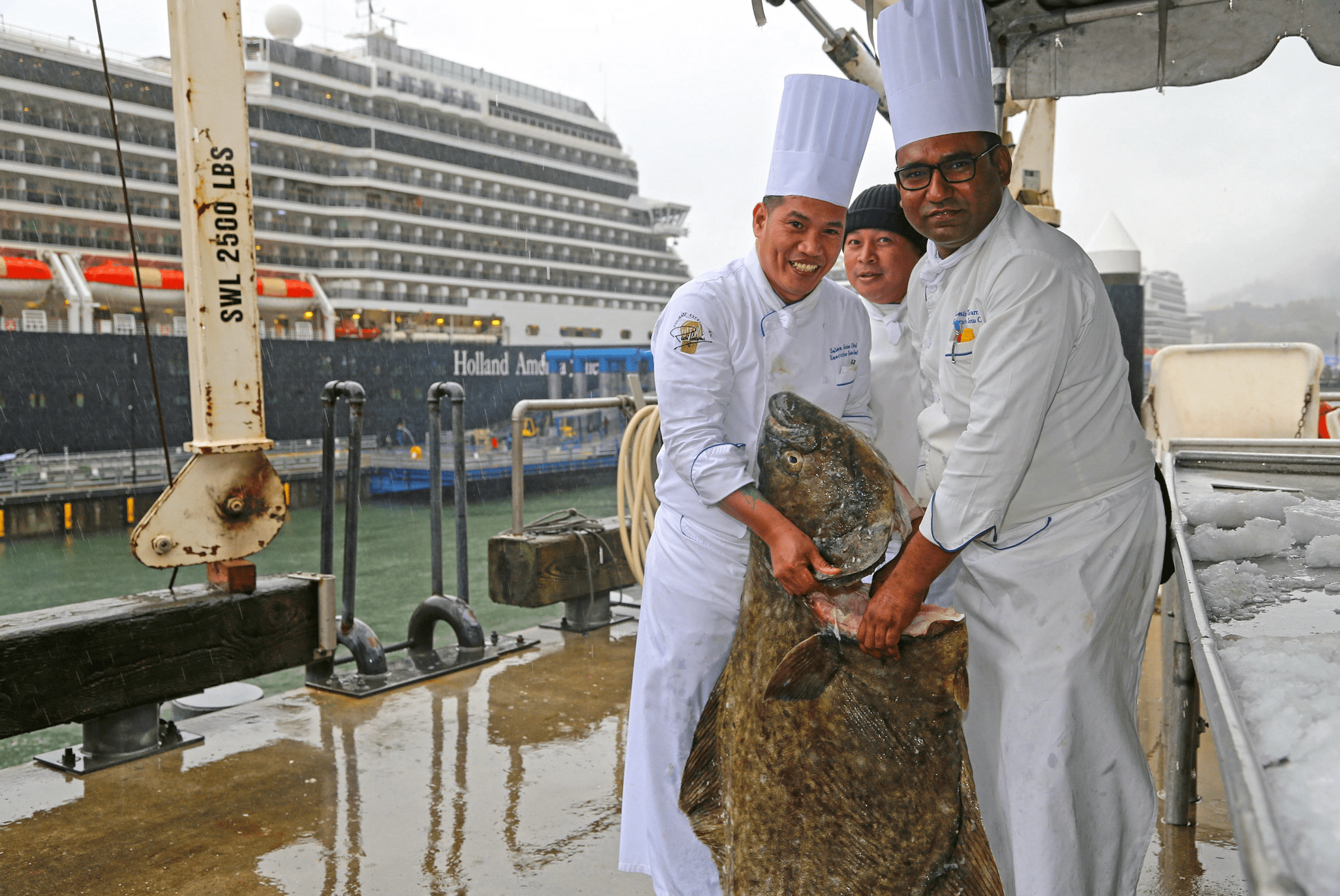 UPTOWN Holland America Chefs Hold Fresh Seafood